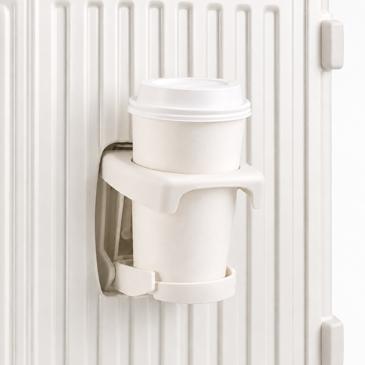 Fold-out cup holder with a takeaway cup