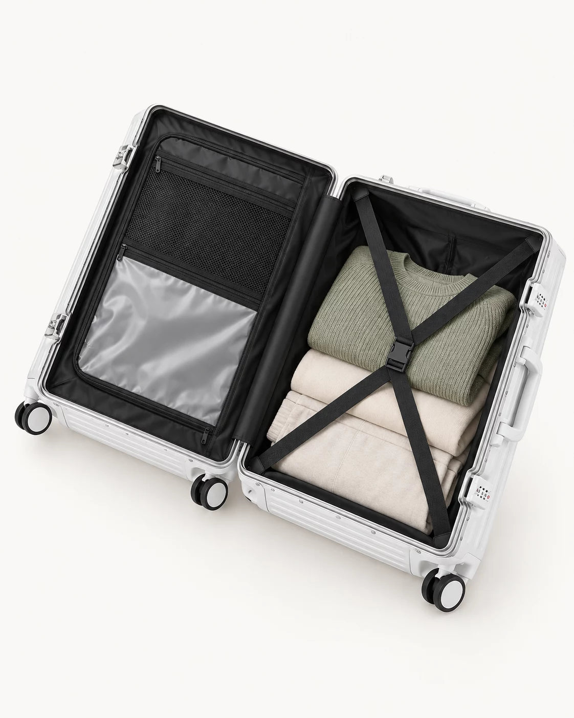 Open white suitcase showing organiser and packing straps
